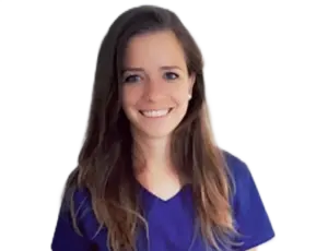 Mosolygó fogorvos színes munkaruhában